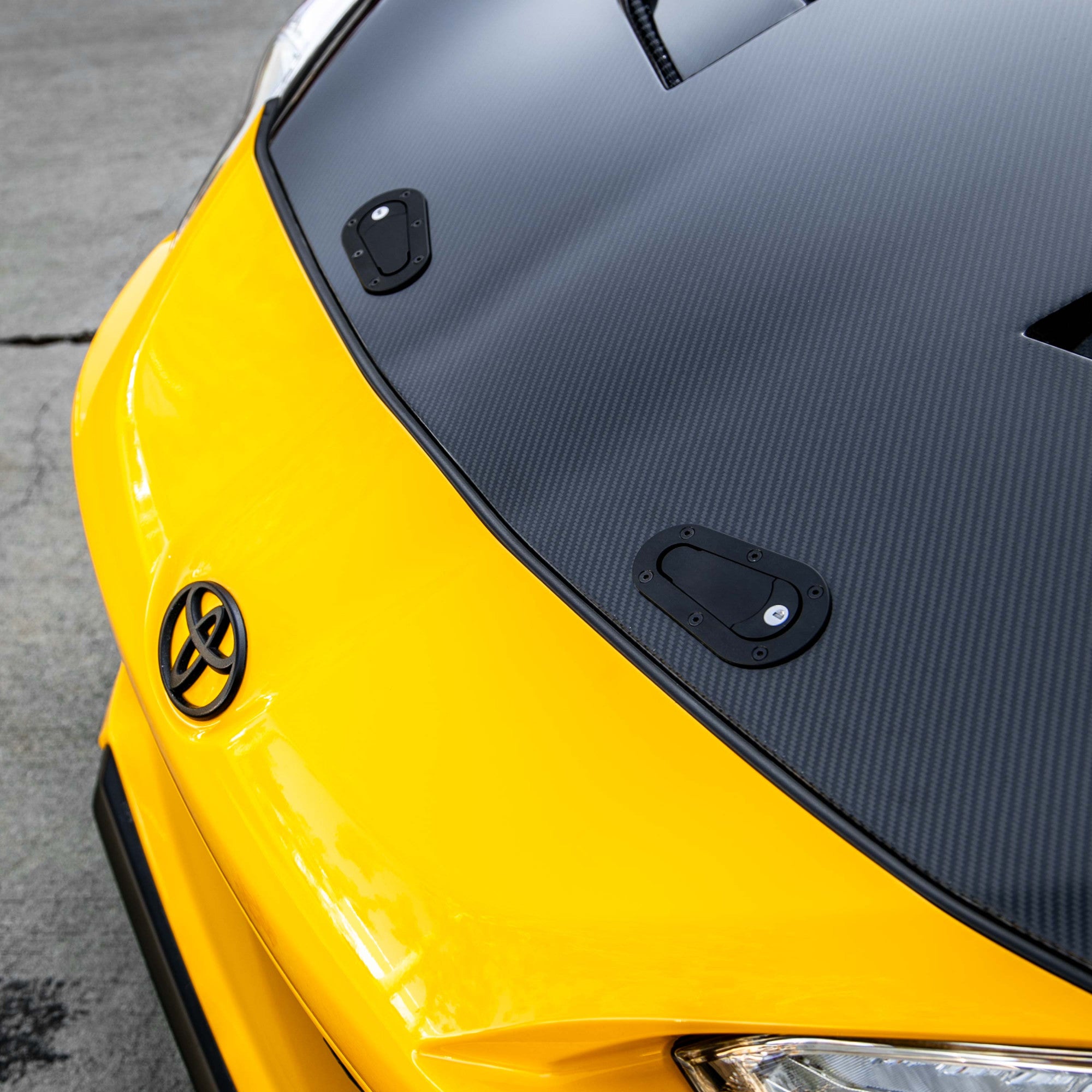 Attache capot Aerocatch